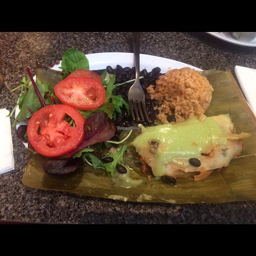 Banana leaf tamale with Spanish rice & salad  at Flacos in Berkeley