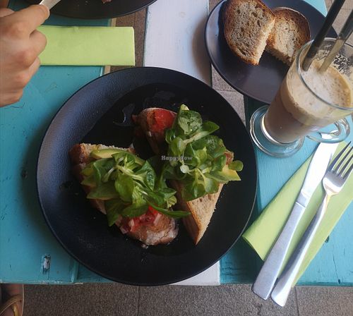 Toasted bread with salsa, avocado and corn salad at Gouf in Tolmin