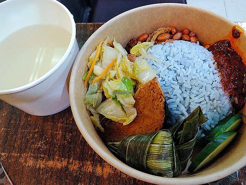 Nasi Lemak with Pandan chicken, cabbage, mock fish, Ikan bilis, peanut and sambal chilli at Pine Tree Cafe 长春树 - Fortune Centre in Central Singapore