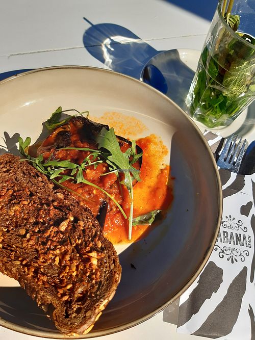 Lunch with garlic eggplant at Habana Beach in The Hague