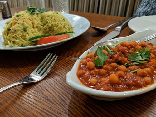 Heart shaped vegan Biriani with chickpea side dish  at Panshee in Swansea