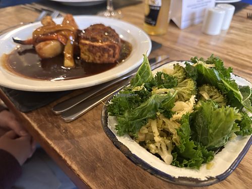 Red pepper and lentil bake with greens on the Sunday menu  at Kings Arms Hotel in Abergavenny