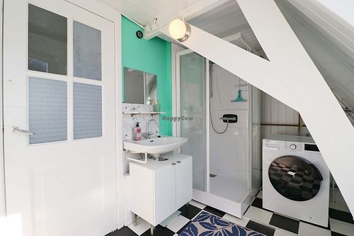 Shared bathroom (with owners) and free use of washing machine.  at Huize Arbous in Utrecht