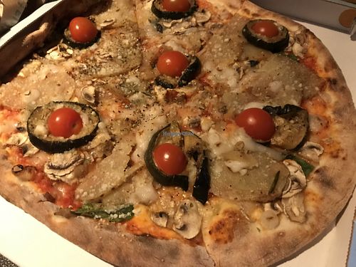 their vegan pizza at Pizza Hytten in Aalborg