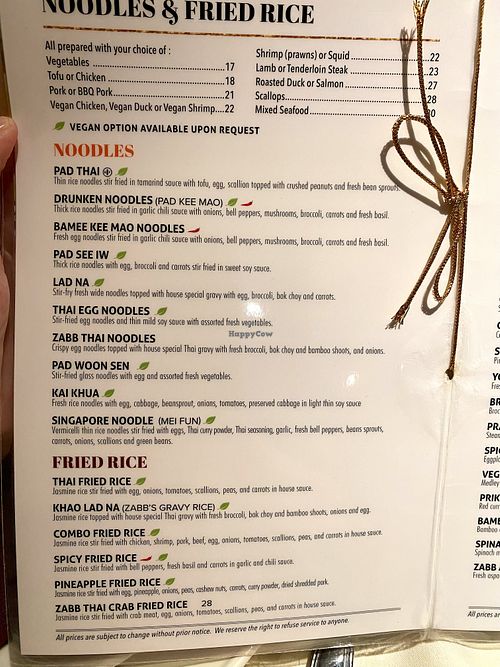Green leaf marks vegan options by request in the main menu   at Zabb Thai Cuisine Newport Beach in Newport Beach