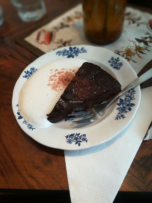 Vegan kladdkaka with soy whipped cream at Hedbergs Bok Musikkafe in Visby