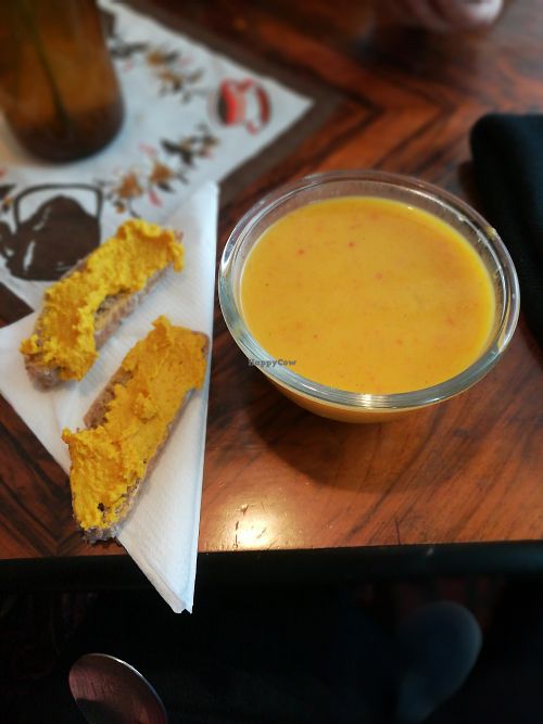 Butternut squash soup with coconut milk and chili, bread with turmeric hummus at Hedbergs Bok Musikkafe in Visby