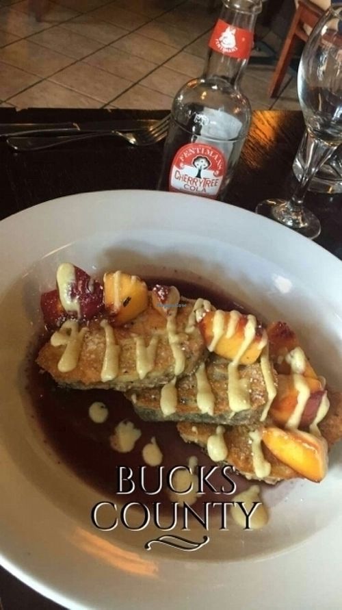 French toast with sliced peaches in season at Sprig and Vine in New Hope