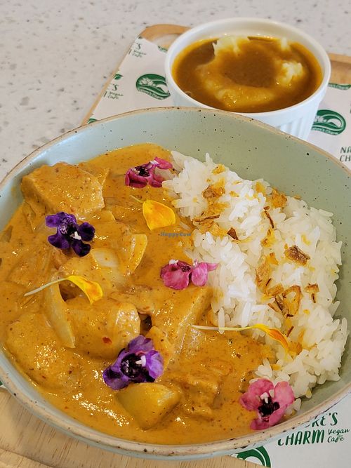 Masaman with a side of mashed potatoes at Nature's Charm in Bangkok