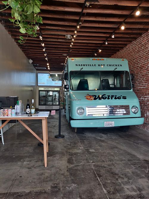 Storefont with truck at Wolfie's Nashville Hot Chicken in Los Angeles