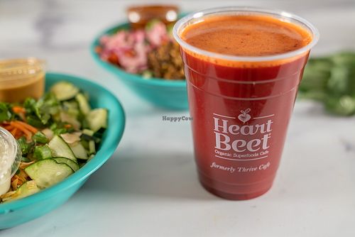 Longevity juice and Thai bowl (left), Thrivalicious Bowl (in background) at HeartBeet Organic Superfoods Cafe - West Seattle in Seattle