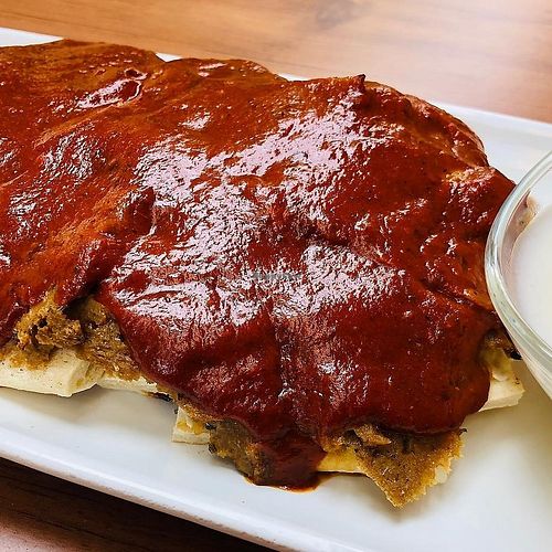 Vegan Iskender (a Turkish speciality of vegan doner slices on chopped flat bread with tomato sauce and vegan yogurt on the side) at Veganzza in Istanbul