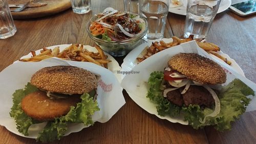 Seitan burger and fish burger with sallad at vego Foodworld in Berlin