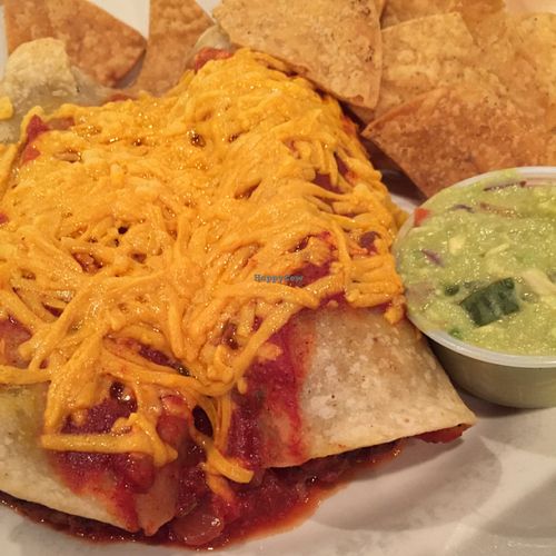 chorizo & pinto enchiladas w Daiya cheddar (vegan) at Seva - Ann Arbor in Ann Arbor