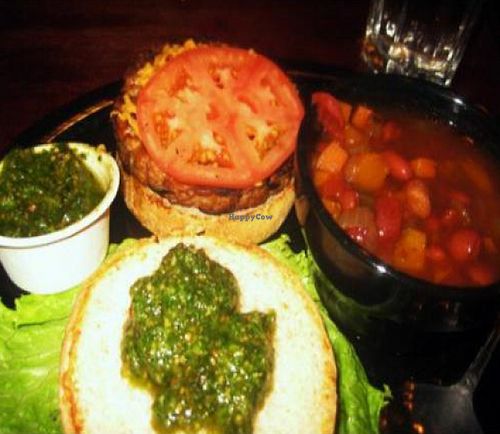 Tempeh burger with Daiya cheese and basil-cashew pesto by i dream of greenie at Seva - Ann Arbor in Ann Arbor