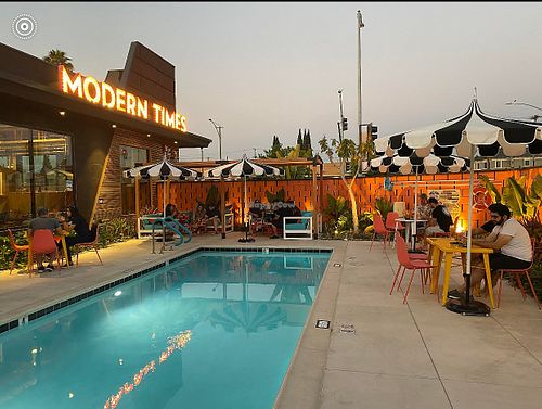 Pool view at dusk at Modern Times Leisure Town in Anaheim