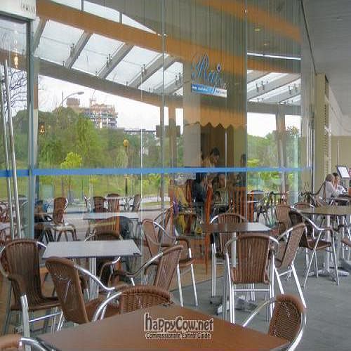 Exterior Seating Area with a Green View ... at Raj Restaurant - Biopolis in Central Singapore