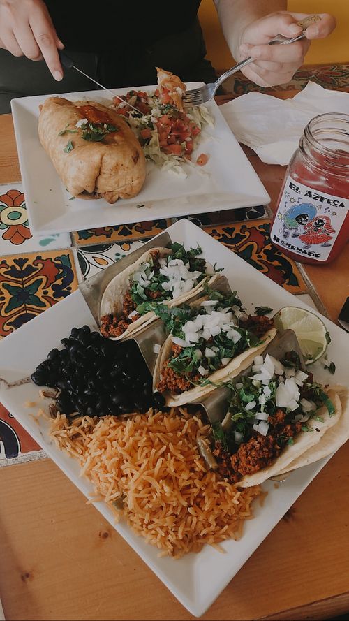 Tacos and chimichanga with soy chorizo. Subbed black beans for refried, as refried are not vegan   at El Azteca Mexican Deli in Poughkeepsie
