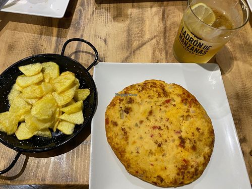 Tortilla de patatas with fries at O Pote Cafetería Tapería in Castro Caldelas