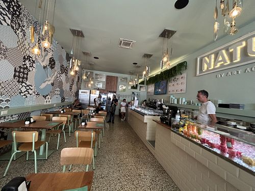 the restaurant offers seating  inside and outside  at Natura by Art Academy in Olbia