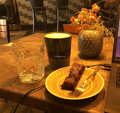  Vegan brownie and oat milk latte  at Råhygge in Copenhagen