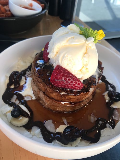 Vegan chocolate pancake stack with soy ice cream  at The Local Collective in Galston