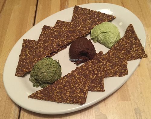 Trio Sampler @Ecopolitan. Pesto, Hummus and olive tapenade with flax crackers at Ecopolitan in Minneapolis