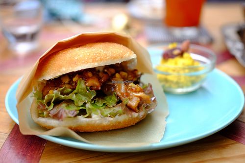 Teriyaki "chicken" donut burger and a side of turmeric hummus at Hatena in Tokyo