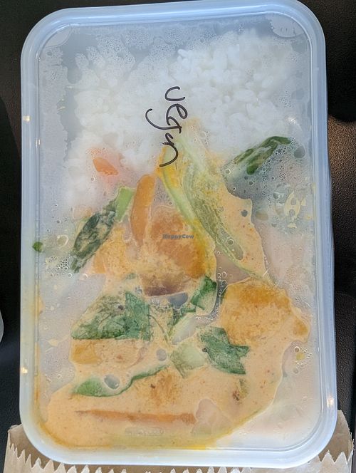 Vegan curry in plastic takeaway container at Crooked Kitchen in Bendigo