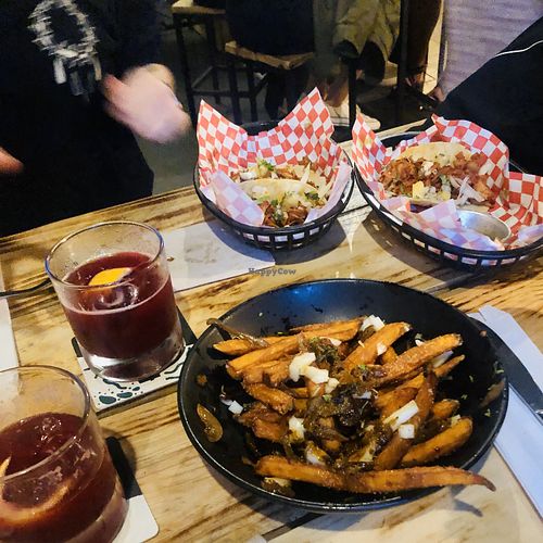 Beetroot cocktail, loaded poutine and tacos  at Plant Base in Lisbon