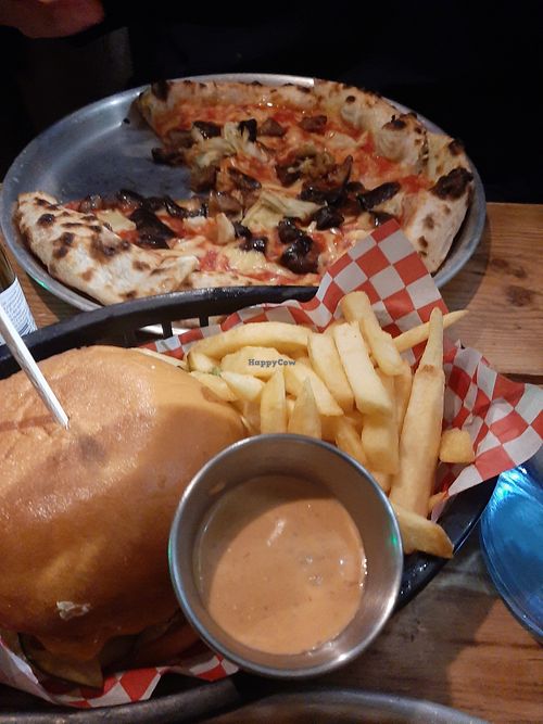 Classic burger and Pizza at Plant Base in Lisbon