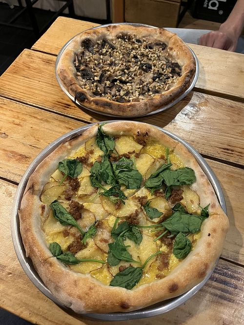 Fungee pizza and potato pizzaa  at Plant Base in Lisbon
