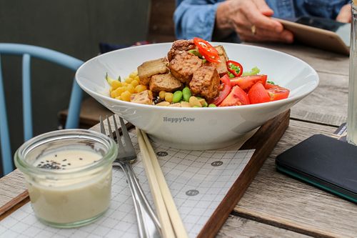 vegan bowl with tahini sauce - sweet potato noodles, tofu, tempeh, vegetables, etc. at Karlstejn 34 in Karlstejn