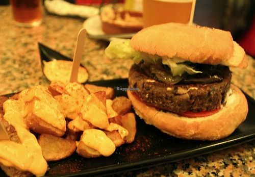 Black Cat Burger with patatas  at Cat Bar in Barcelona
