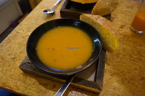 Tasty pumpkin soup with a chunk of fresh bread at Terre Mere in Liege