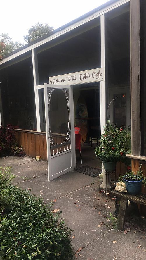 adorable you hidden inside a garden  at Lotus Cafe in Panama City Beach