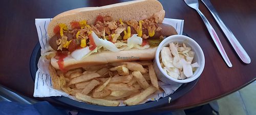 Vegi hot dog with fries and apple slaw at The Dub in Henley On Thames