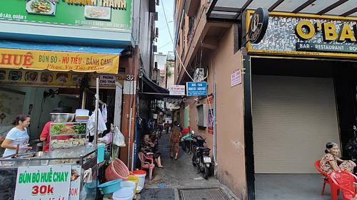 enter through this small lane at Tue Tin Chay Quan in Ho Chi Minh City