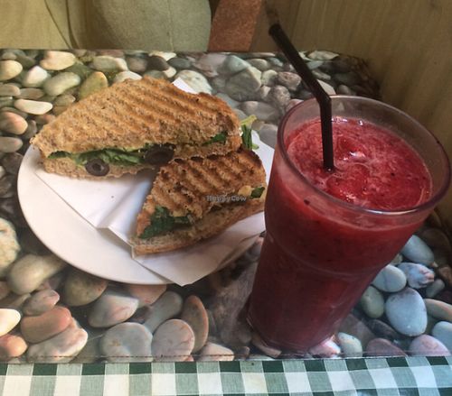 hummus, olive and spinach sandwhich with the berry smoothie at Nexus Art Cafe in Manchester