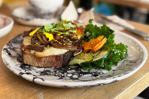 Toast with oyster mushrooms. at Pequeno Café e Bistrô - Arroios in Lisbon