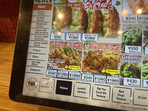 Vegan menu on iPad - go to dumplings and than swipe right   at Kakekomi Gyoza in Tokyo