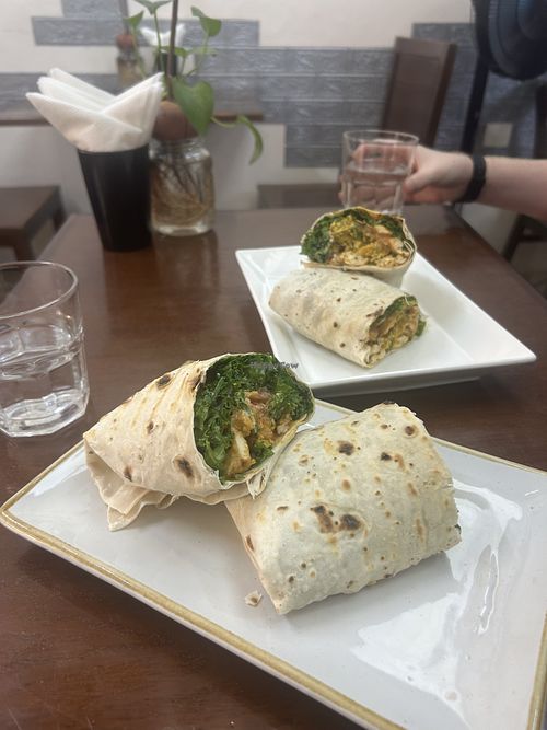 tofu wrap with kale tofu tomatoes special sauce and falafel  at Abracado in Hanoi
