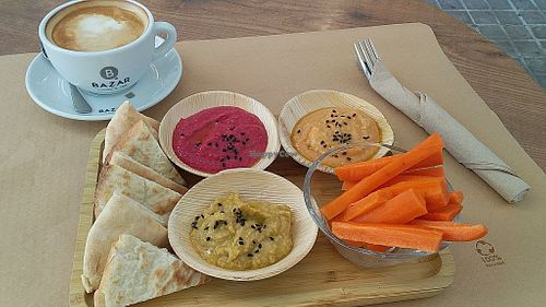 Trio of houmous dips with bread and carrot sticks at Amapola Tasty Moments in Valencia