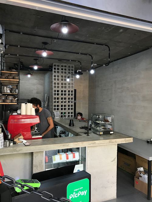 Inside seating at Concreto Coffee Crew in Brasilia