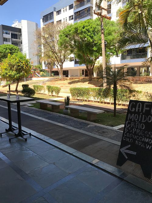 Outdoor seating at Concreto Coffee Crew in Brasilia