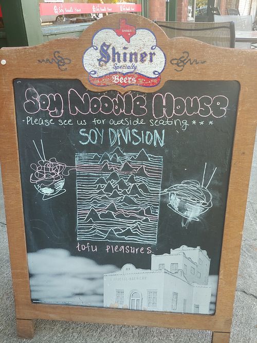 Clever billboard for the rock fans out there! at Soy Noodle House in Augusta