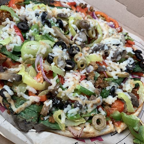 Veggie with vegan meat & cheese at Rapid Fired Pizza in Kettering