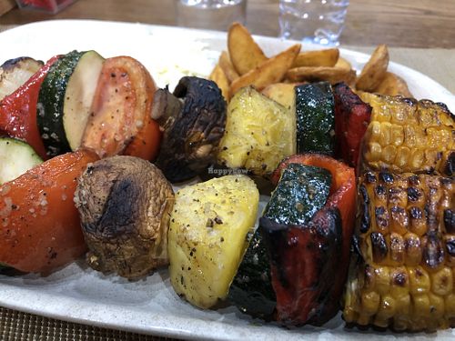 Vegetables kebab with homemade fried potatoes and rice   at Atlético in Faial