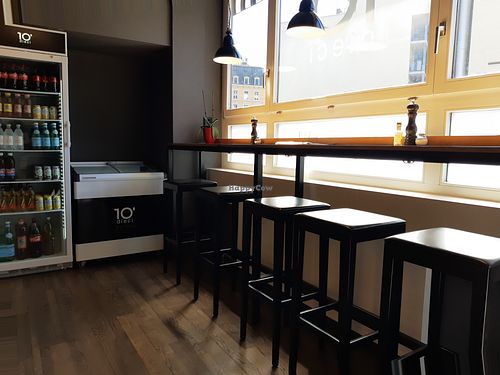 Minimal indoor seating at Dieci Pizza in Biel