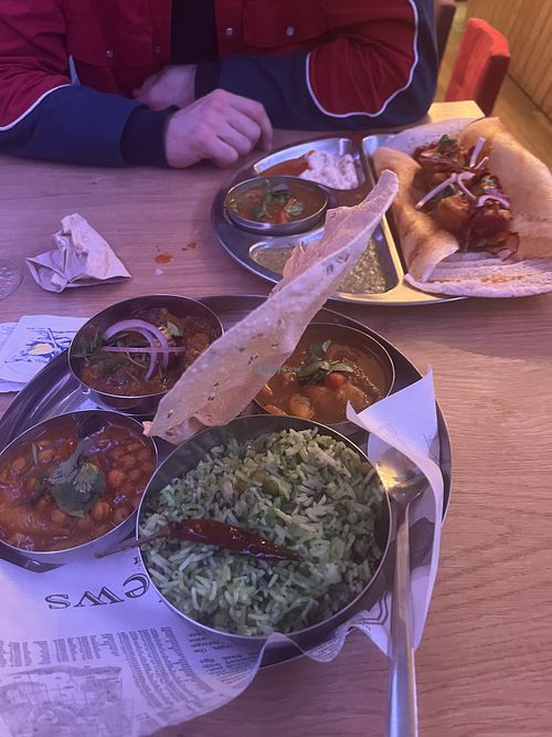 Vegan curry option with the chana, sambar, and eggplant options and a dosa potato masala.   at Ganesh in Brussels